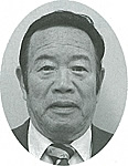 北野地区常任委員会委員の男性議員一人目の白黒顔写真