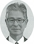 北野地区常任委員会委員の男性議員二人目の白黒顔写真